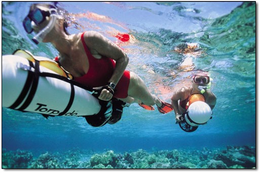 Woman Snorkeling with a Sea Scooter